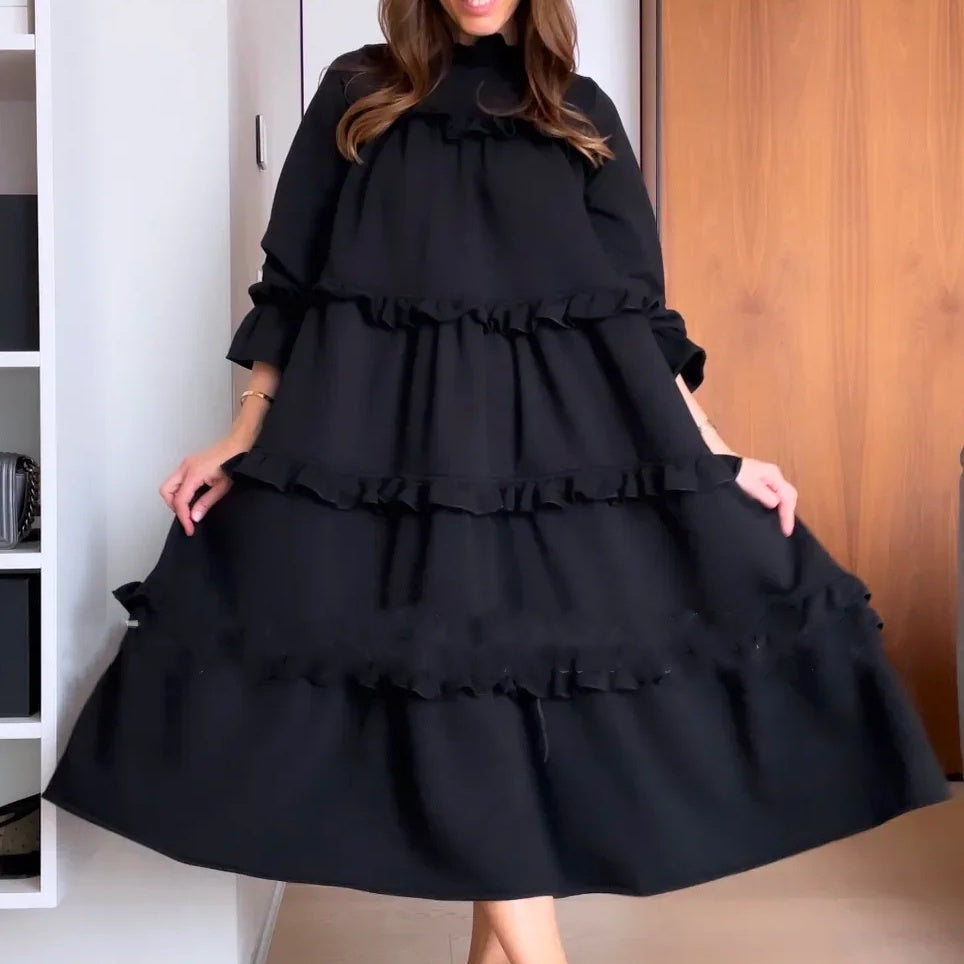 Damenkleid mit Rundhalsausschnitt und gestuften Rüschenlagen