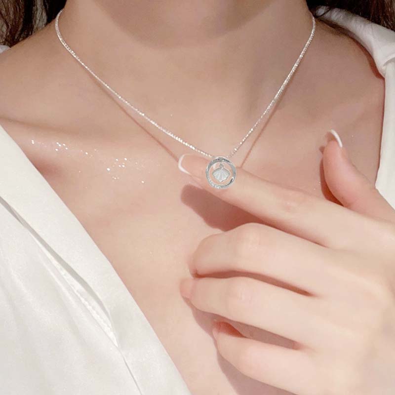🌟 Charmante Halskette mit Zirkonia in Kreisform mit Jakobsmuscheln