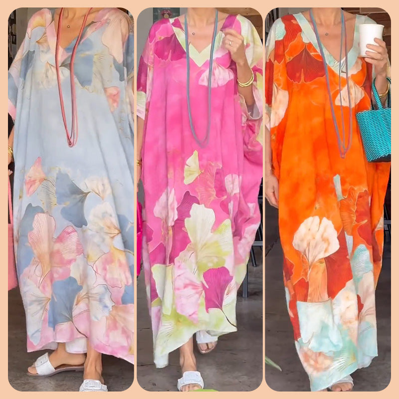 Lockeres langes Kleid mit Blumenmuster und halben Ärmeln