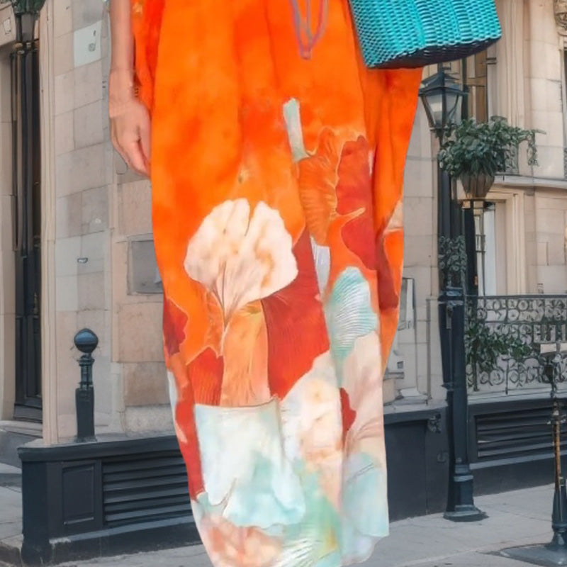 Lockeres langes Kleid mit Blumenmuster und halben Ärmeln