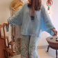Damen-Set aus locker geschnittener Bluse und Hose mit weitem Bein und Blumenmuster
