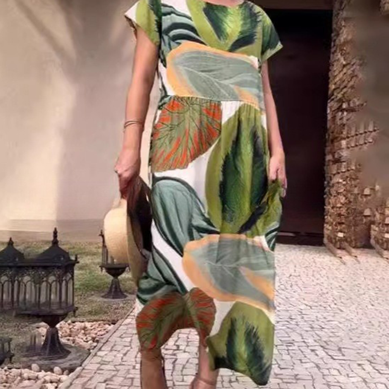 Damenkleid mit Blattdruck, Rundhalsausschnitt, Seitenschlitz und kurzen Ärmeln